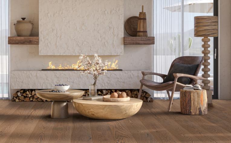 dark hardwood flooring in rustic modern living room with brown and neutral accents.