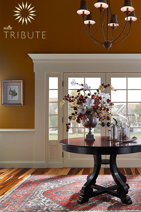 foyer decor with mustard yellow walls 